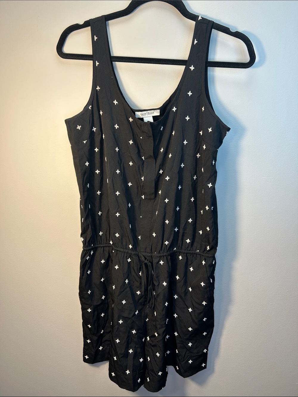 White House Black Market Black Sleeveless Romper with White Cross Print
